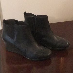 Black leather wedge boots